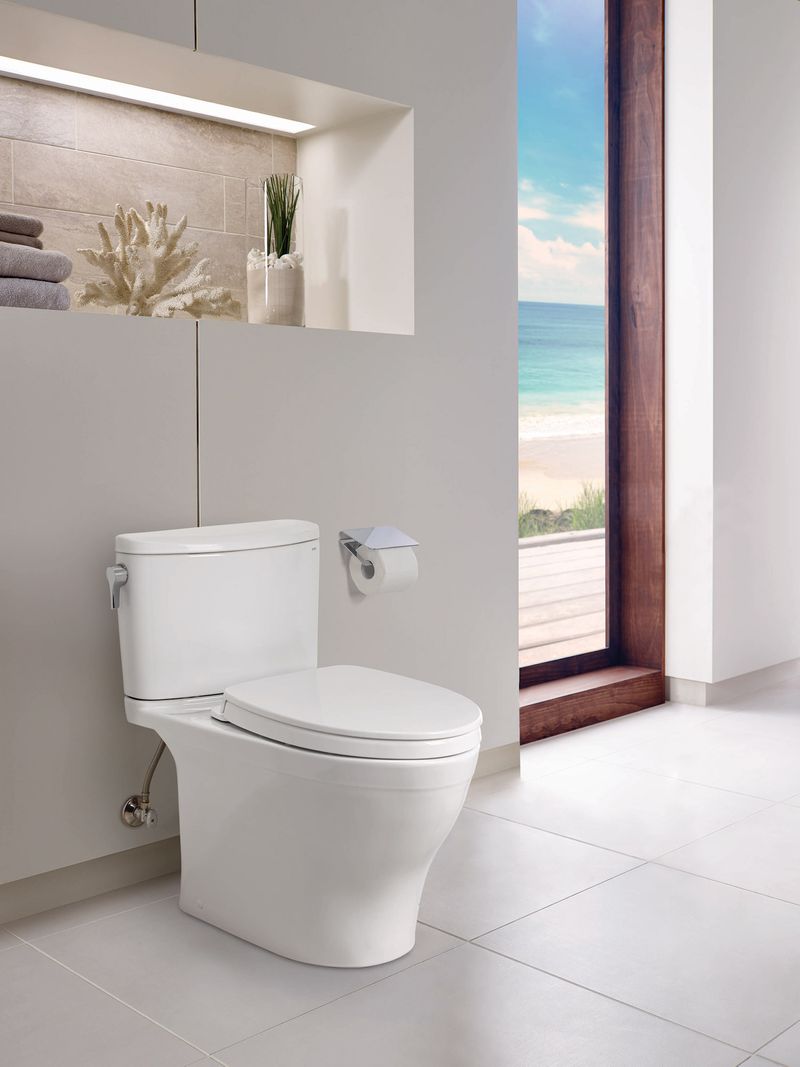 TOTO Nexus Elongated 1.28 gpf Two-Piece Toilet in Colonial White