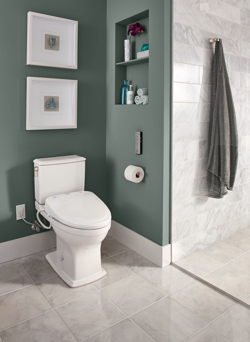 TOTO Connelly Elongated 0.9 gpf 1.28 gpf Dual-Flush Two-Piece Toilet in Cotton White - Seat Included