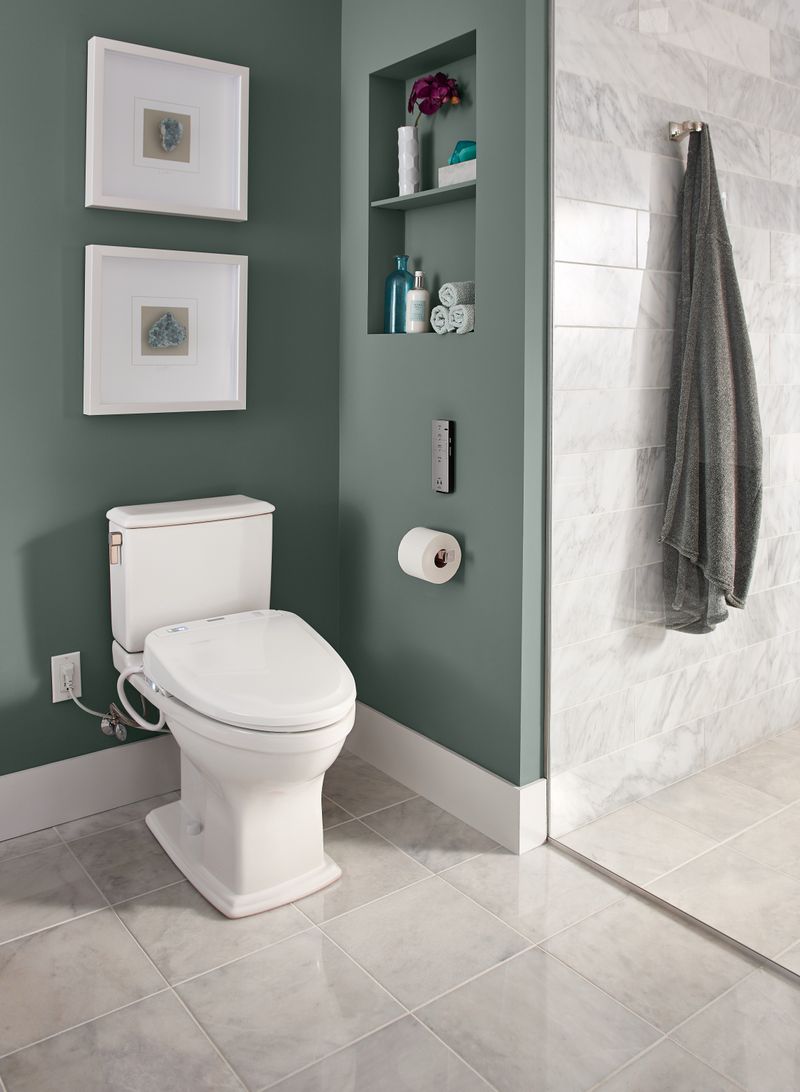 TOTO Connelly Elongated 0.9 gpf 1.28 gpf Dual-Flush Right Hand Lever Two-Piece Toilet in Cotton White - Seat Included